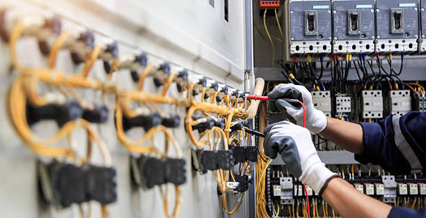 Professional Electrician technician working in Kill Devil Hills, NC